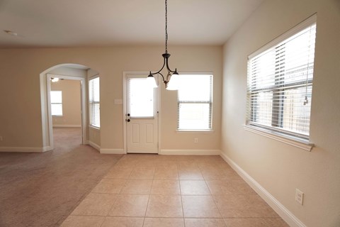 a view of the dining room and entryway from the living room