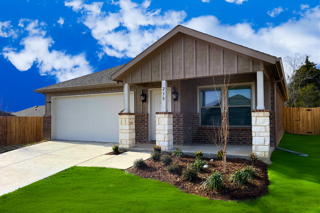 A house with a brown roof and a white garage door.
