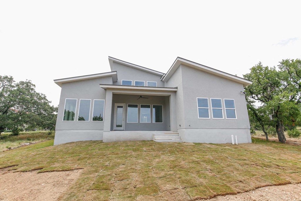 a house with a yard in front of it