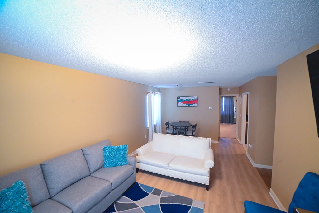 a living room with a couch and a table