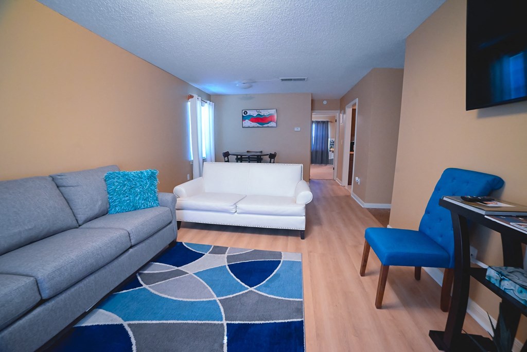 a living room with a couch and a table