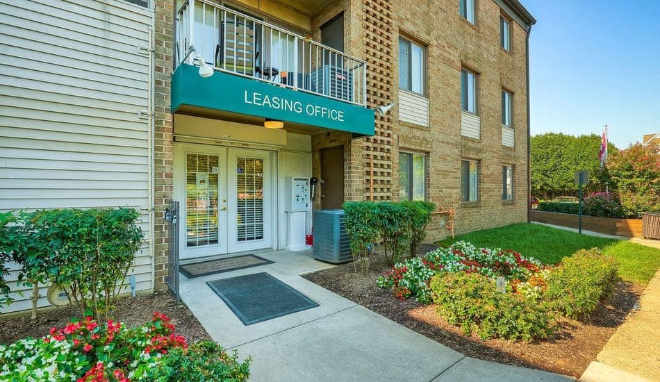 the entrance to leasing office of an apartment building