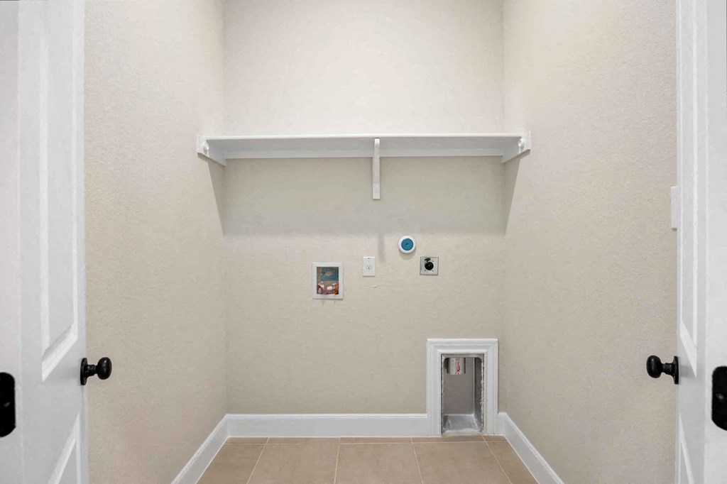 the entrance to a room with a white wall and a door