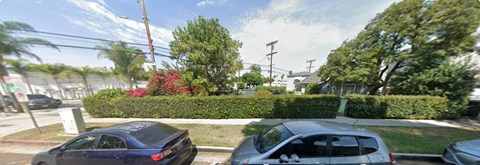 A car is parked on the side of a street.