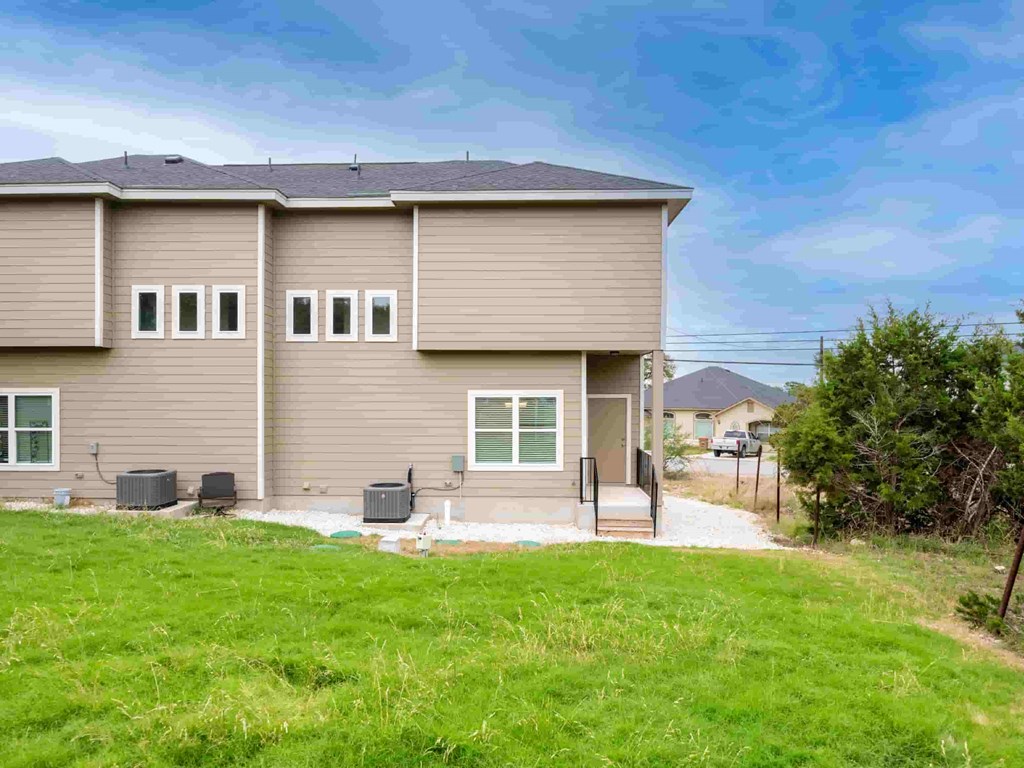 a house with a yard in front of it