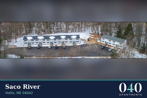 An aerial view of the Saco River apartments in Hollis, ME 04042.