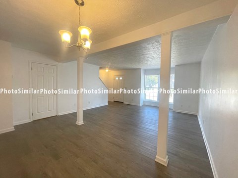 the living room and dining room of the affordable 2400 sq ft