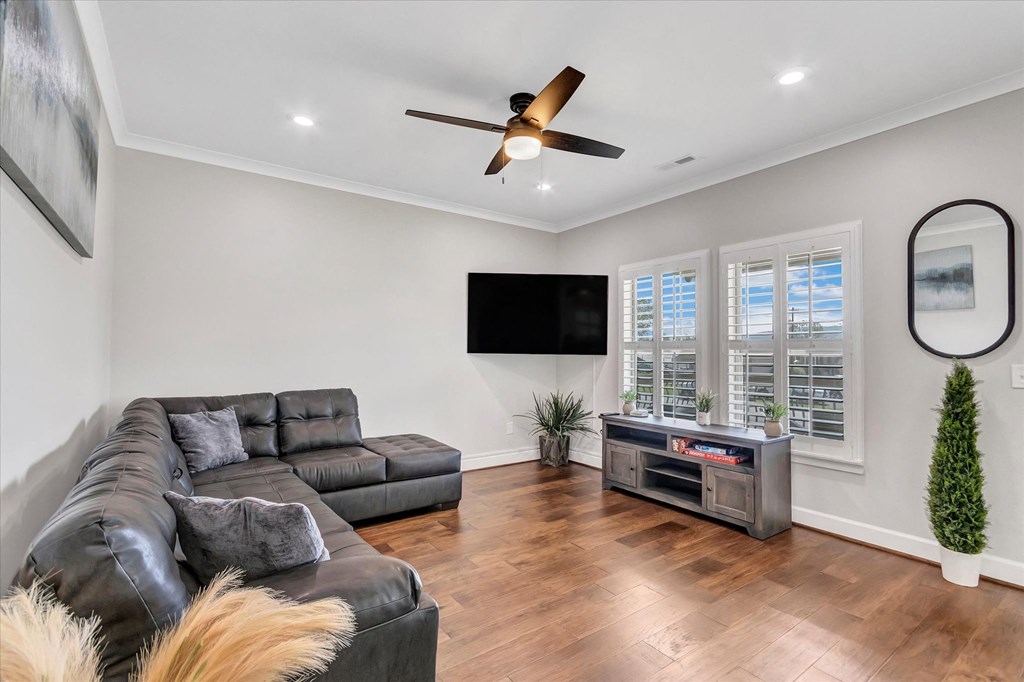 a living room with a couch and a tv