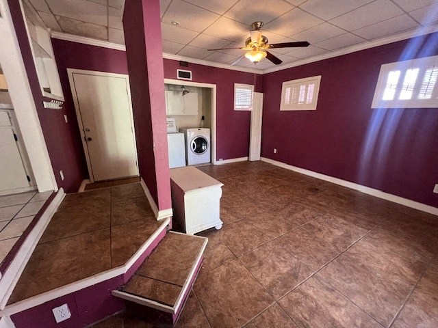 an empty living room with purple walls and a ceiling fan