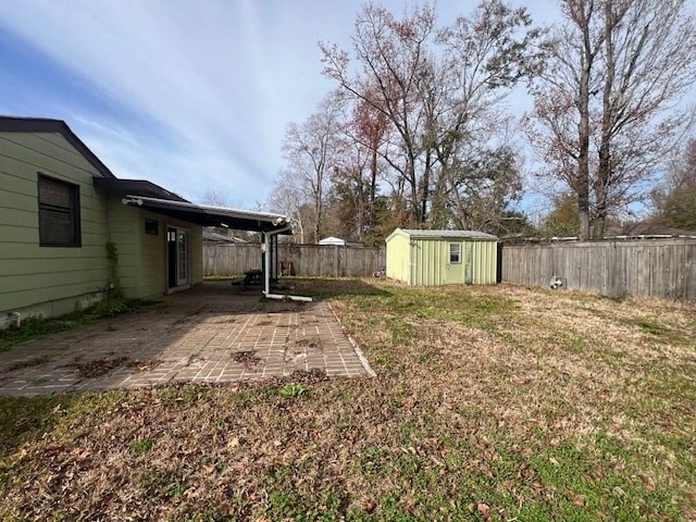 a backyard with a house and a yard and a fence