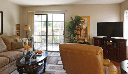 a living room with a couch and a television