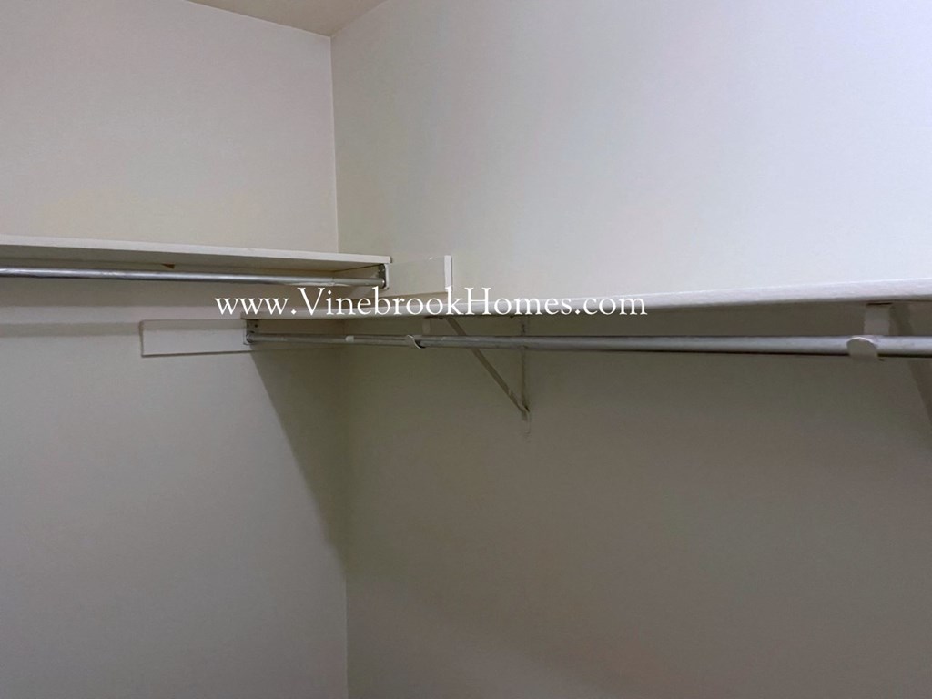 the closet in the second bedroom of the garage