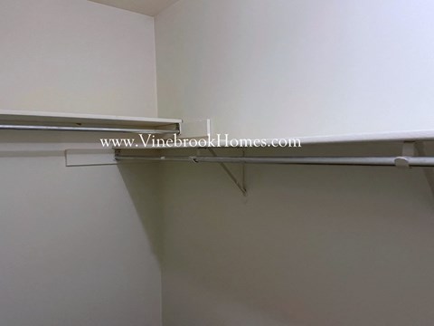 the closet in the second bedroom of the garage