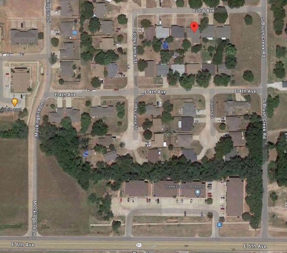 a map of a street with a red dot on it