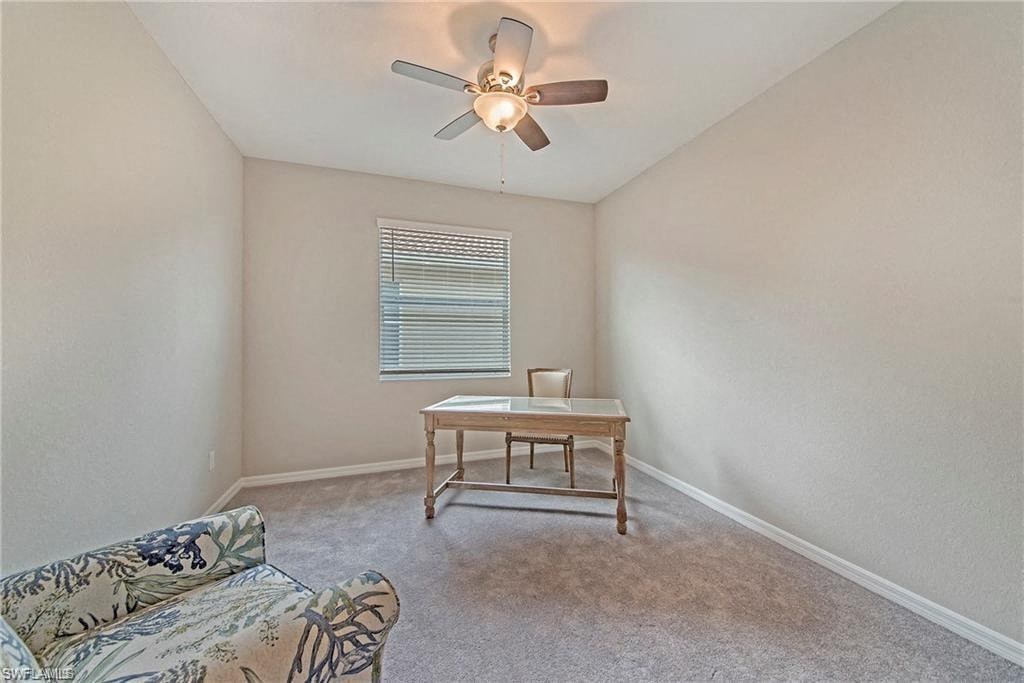 a living room with a couch and a table