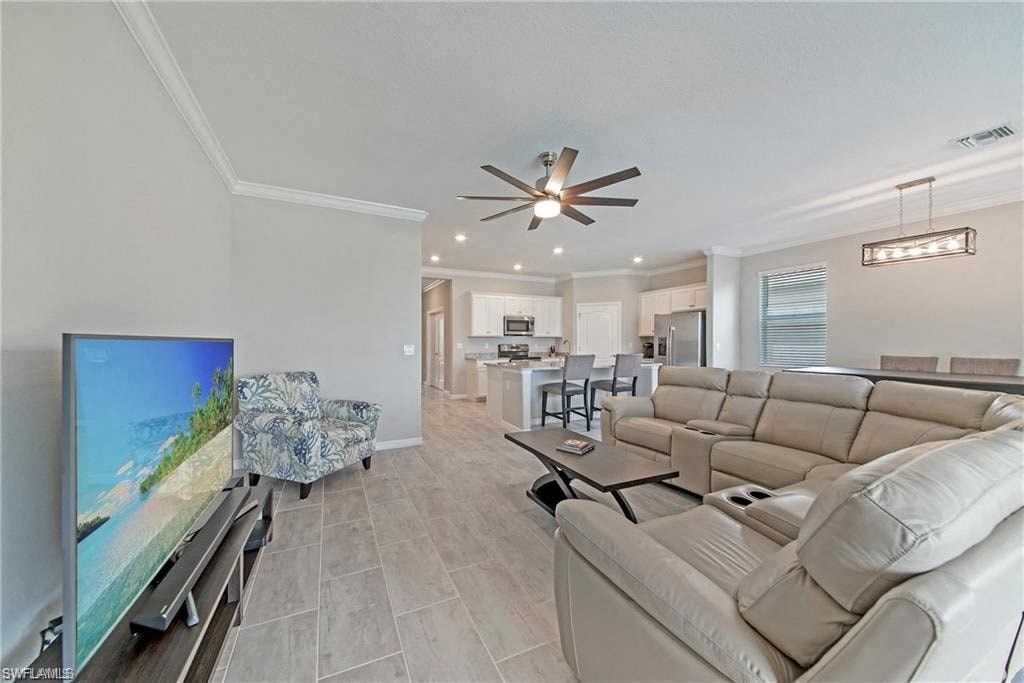 a living room with a couch and a tv