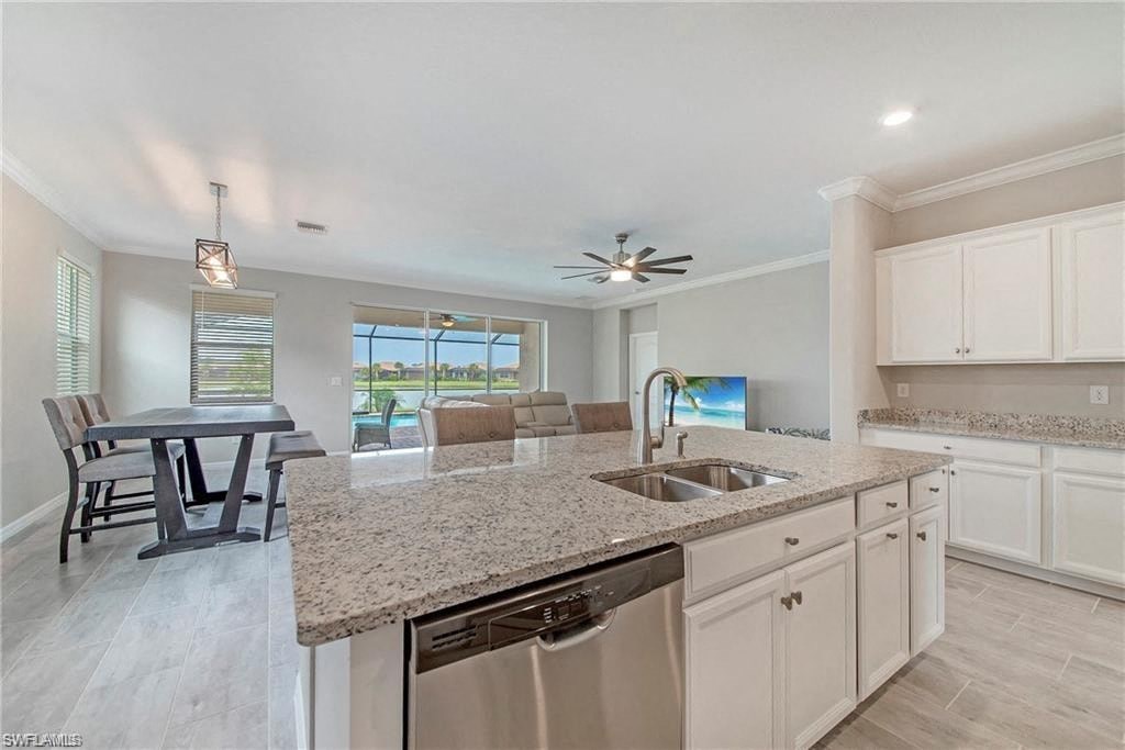 a kitchen with a sink and a counter top