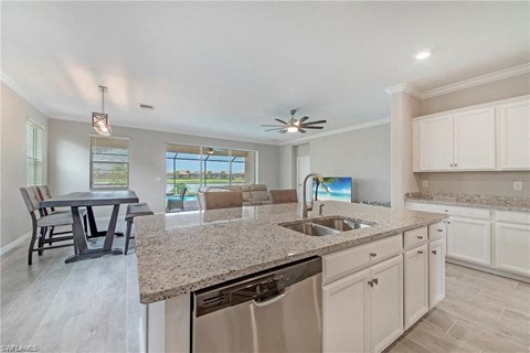 a kitchen with a sink and a counter top