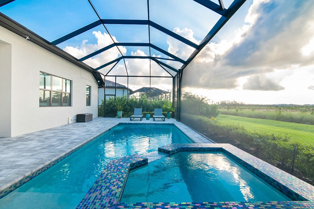a swimming pool with a glass roof over it