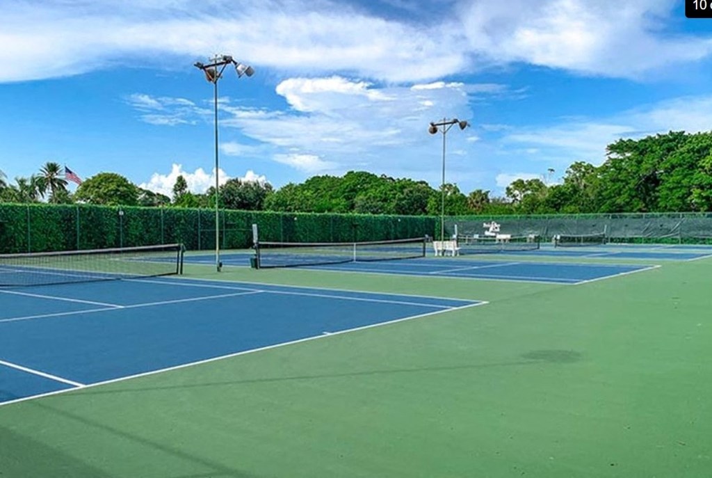two tennis courts on a blue and green court