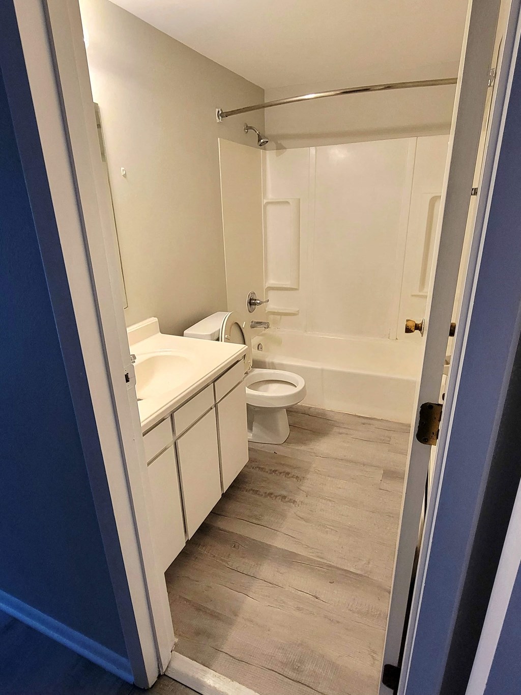 a bathroom with a toilet and a sink