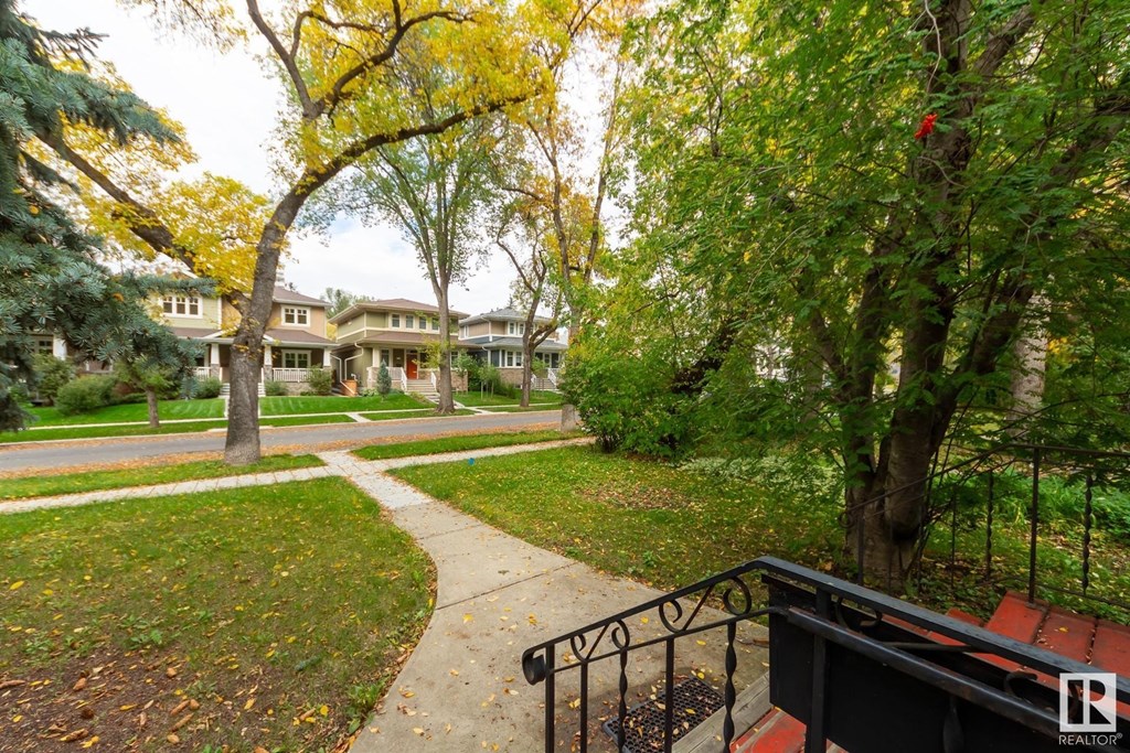 a view of a neighborhood with trees and a staircase