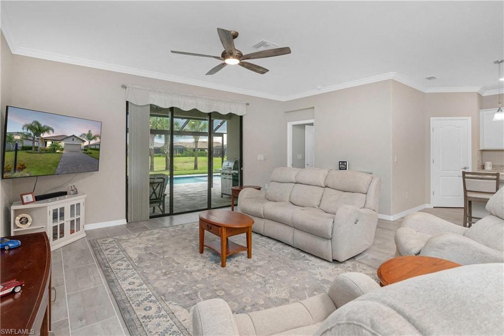 a living room with a couch and a tv