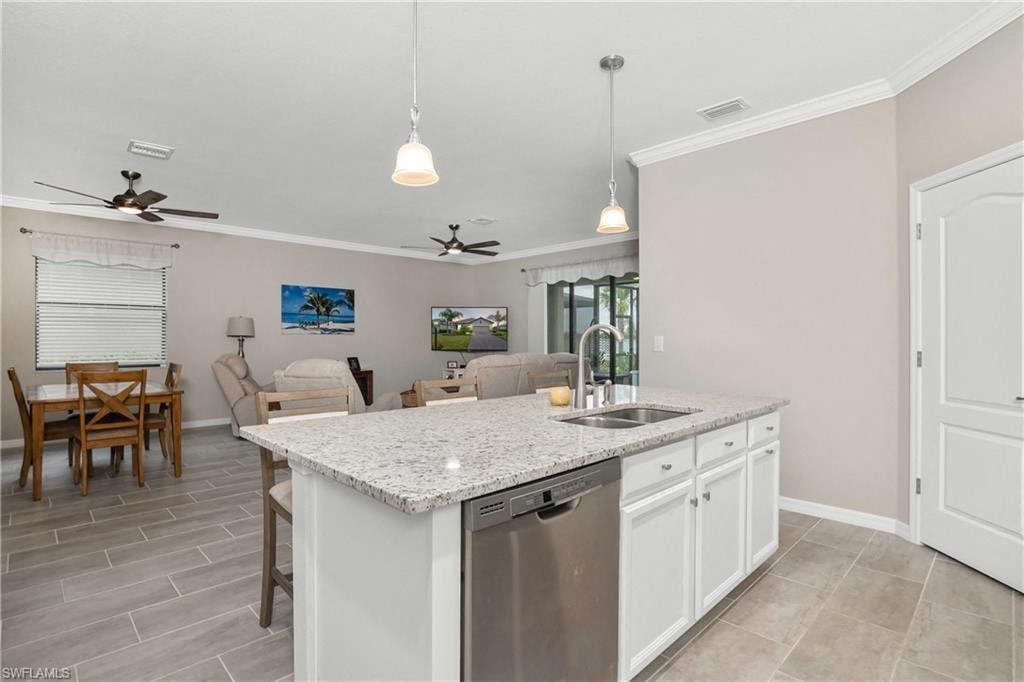 a kitchen with a sink and a counter top