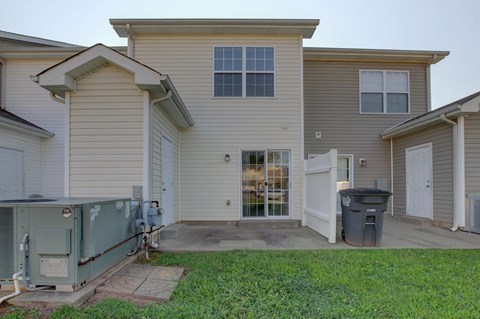 A house with a garage and a driveway.