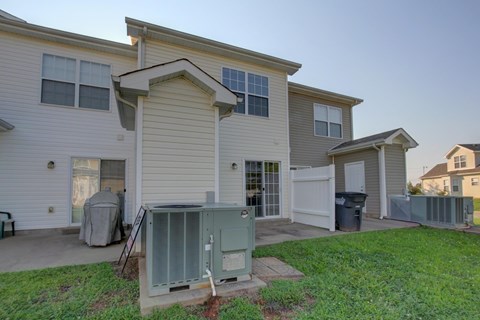 A house with a garage and a driveway.