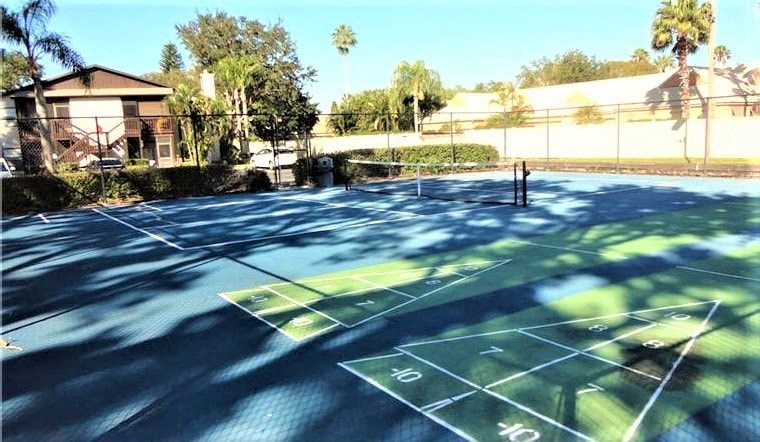 a tennis court with a game on it