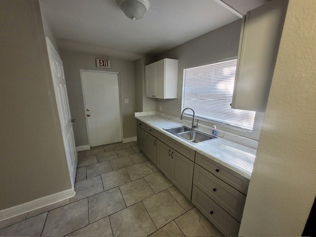 a kitchen with a sink and a window