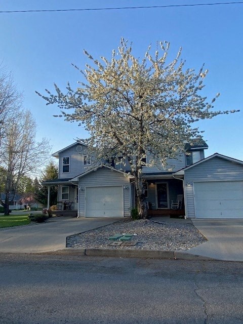 a house with a tree in front of it