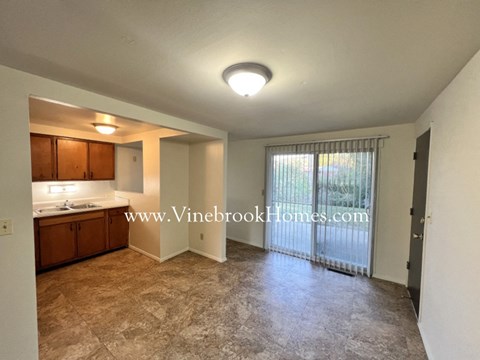 a kitchen with a window and a sink and a counter