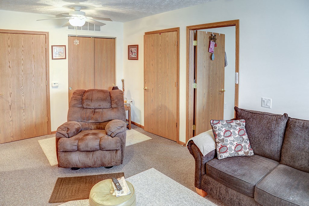 a living room with a couch and a chair