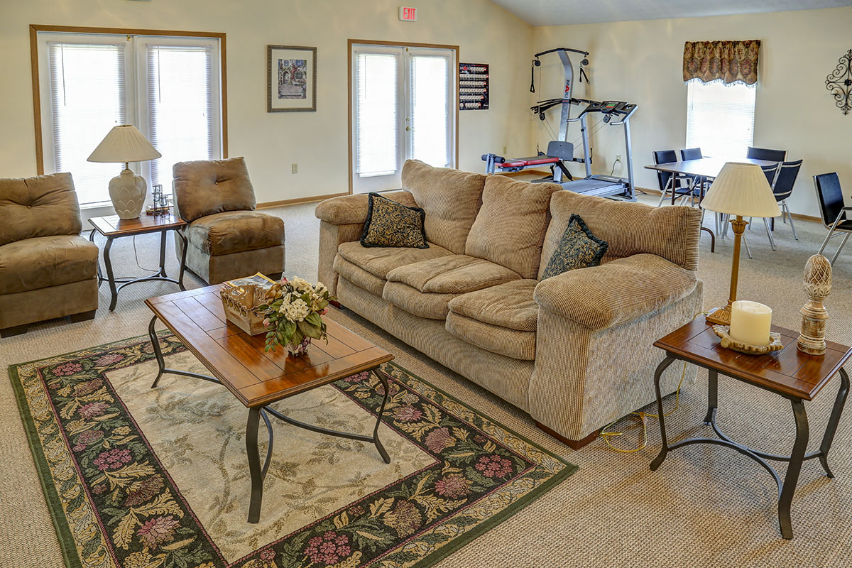a living room with a couch and a table