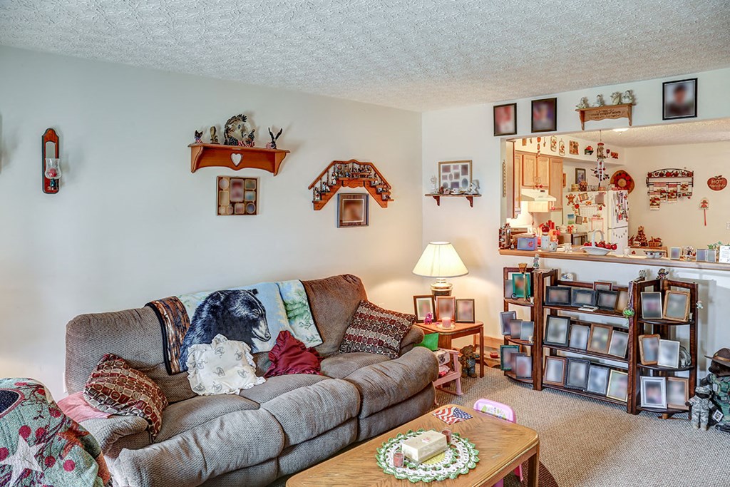 a living room with a couch and a coffee table