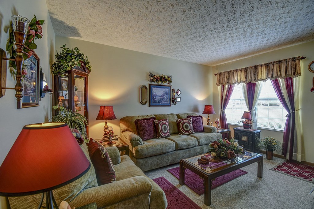 a living room with a couch and a table