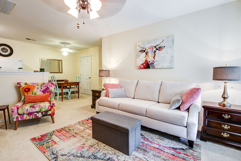 a living room with a couch and a chair