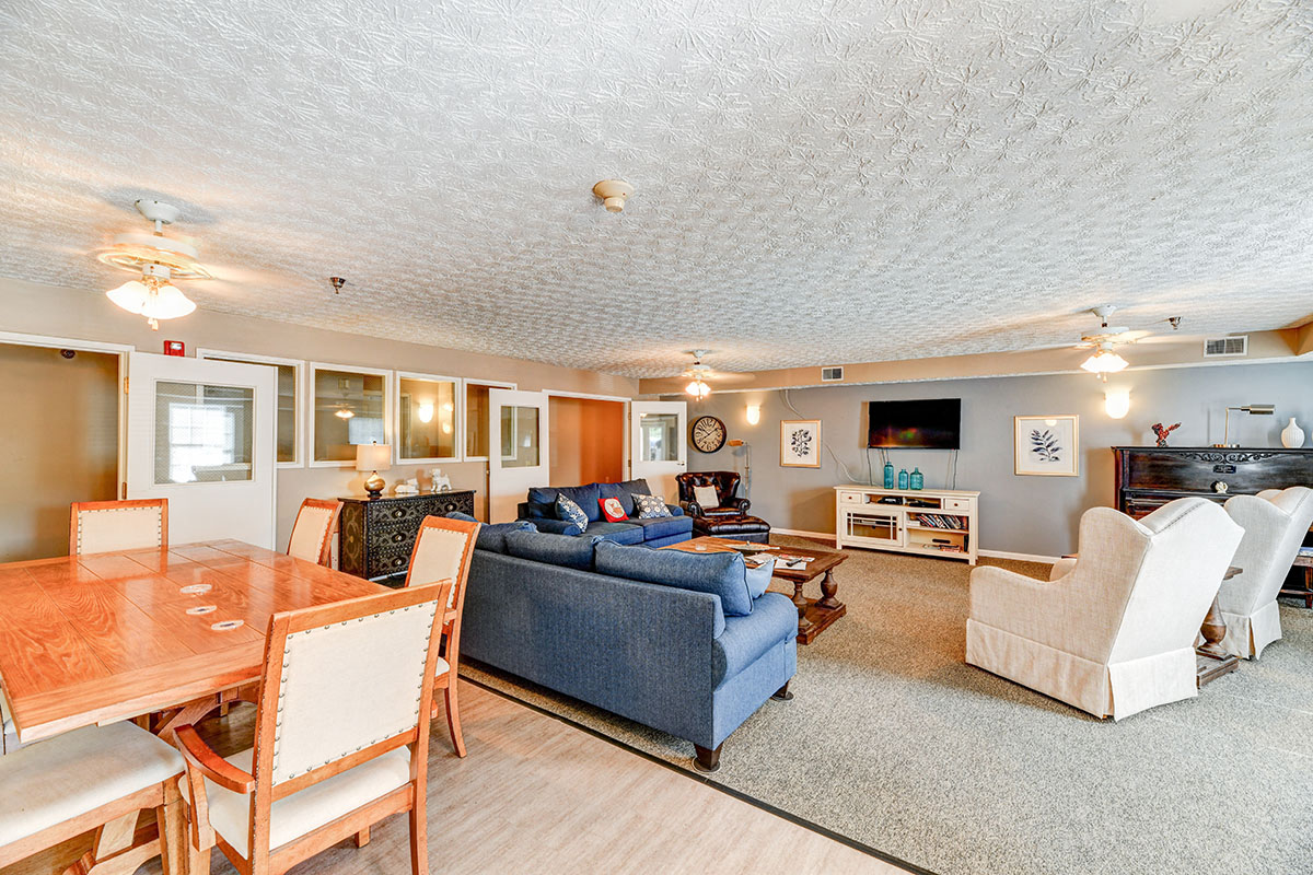 a living room with a couch and a table