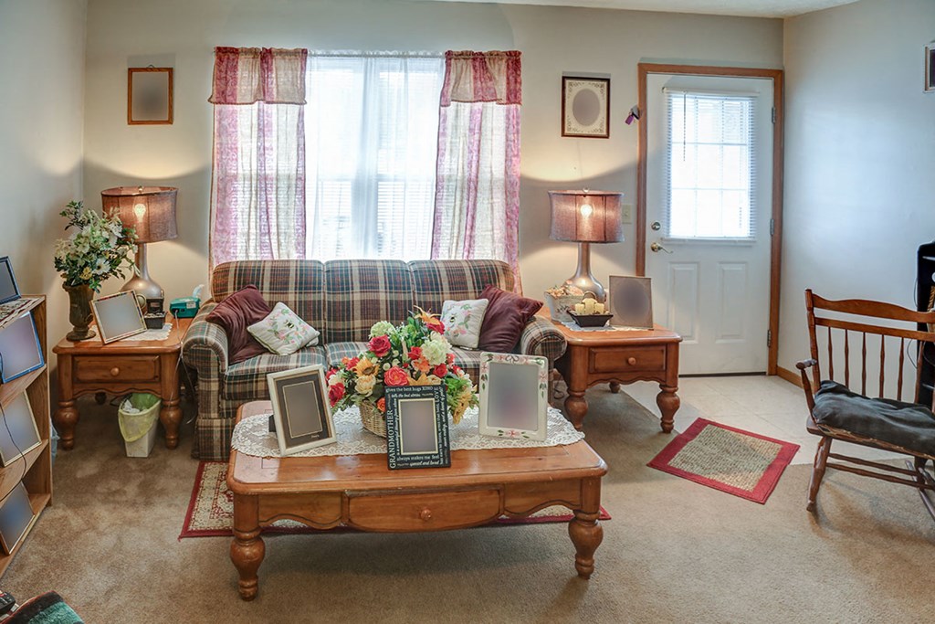 a living room with a couch and a table