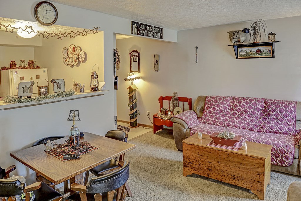 a living room with a couch and a table
