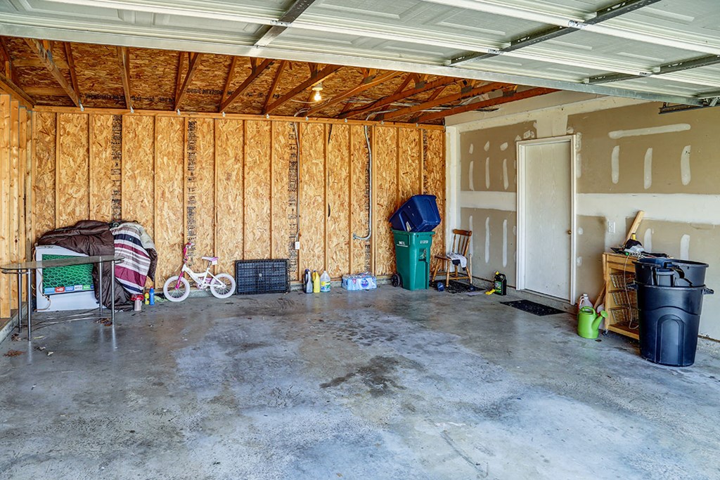 an unfinished garage with a bike in it