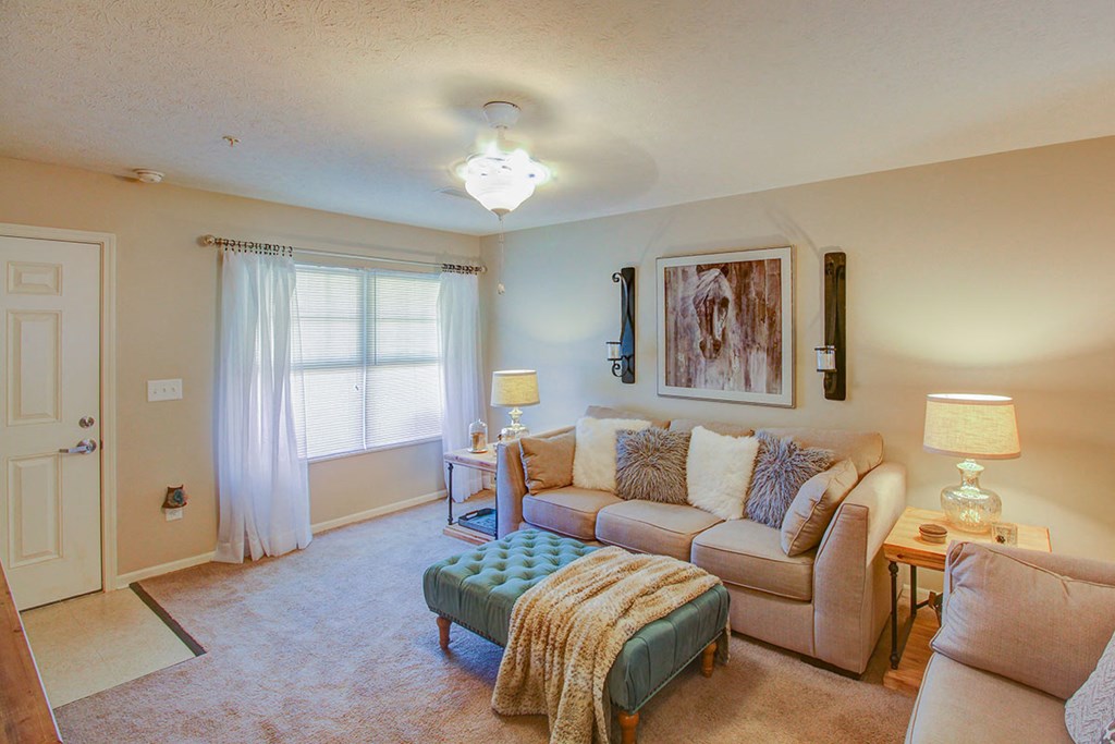 a living room with a couch and a table