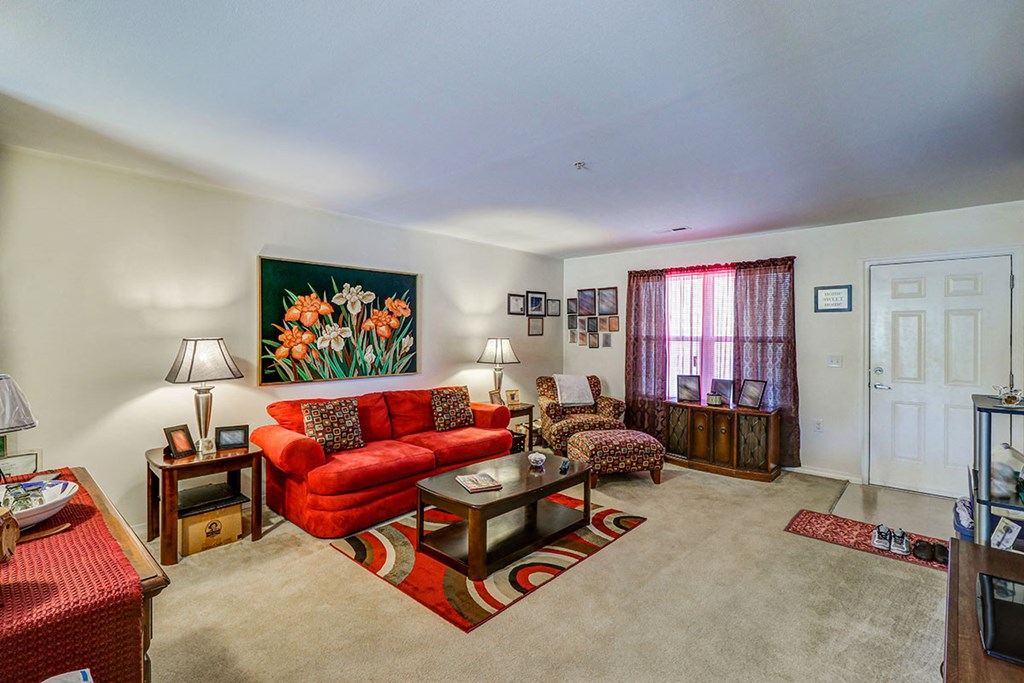 a living room with a couch and a table