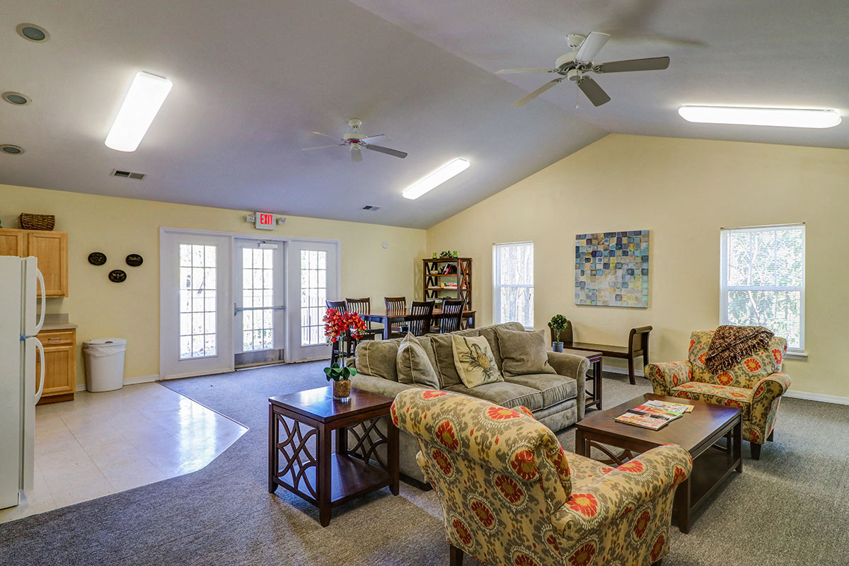 a living room with couches and a table