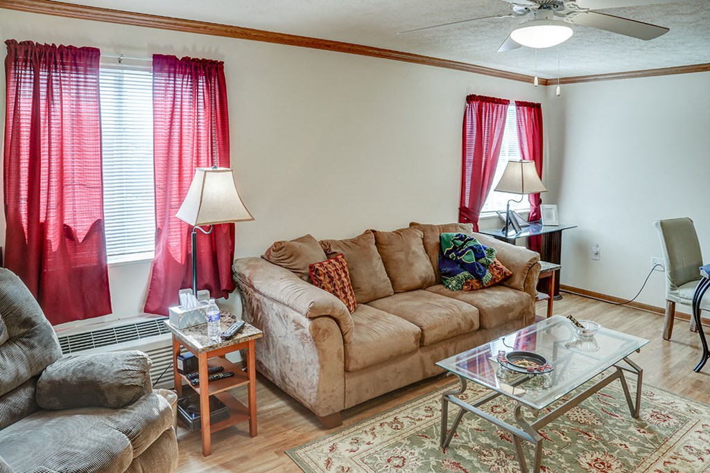 a living room with a couch and a table