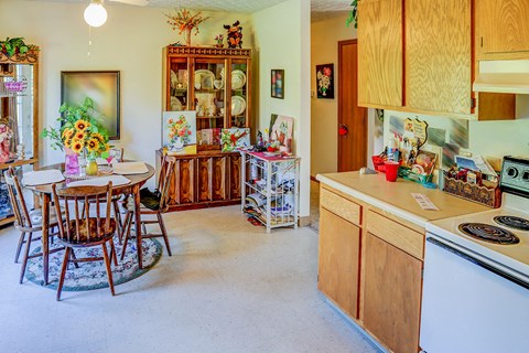 a kitchen with a table and a counter top