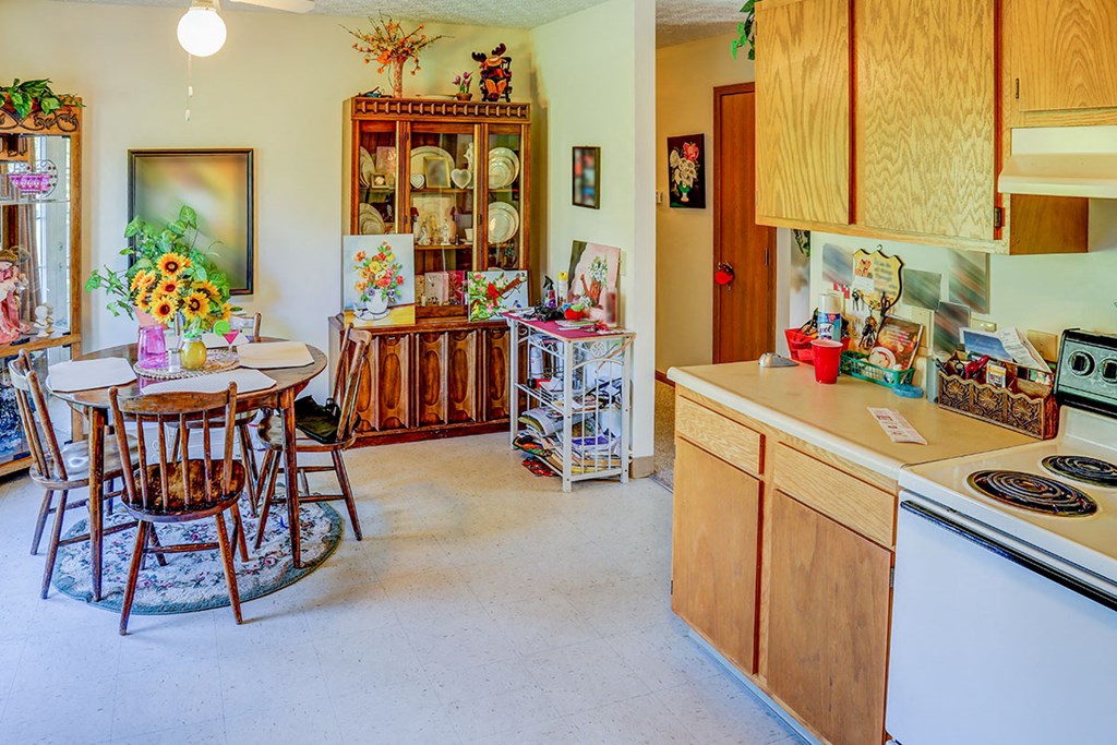 a kitchen with a table and a counter top