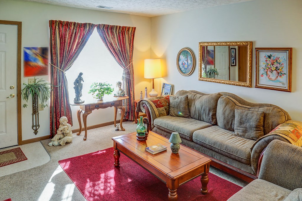 a living room with a couch and a coffee table